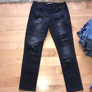 Black jeans with sparkle rips